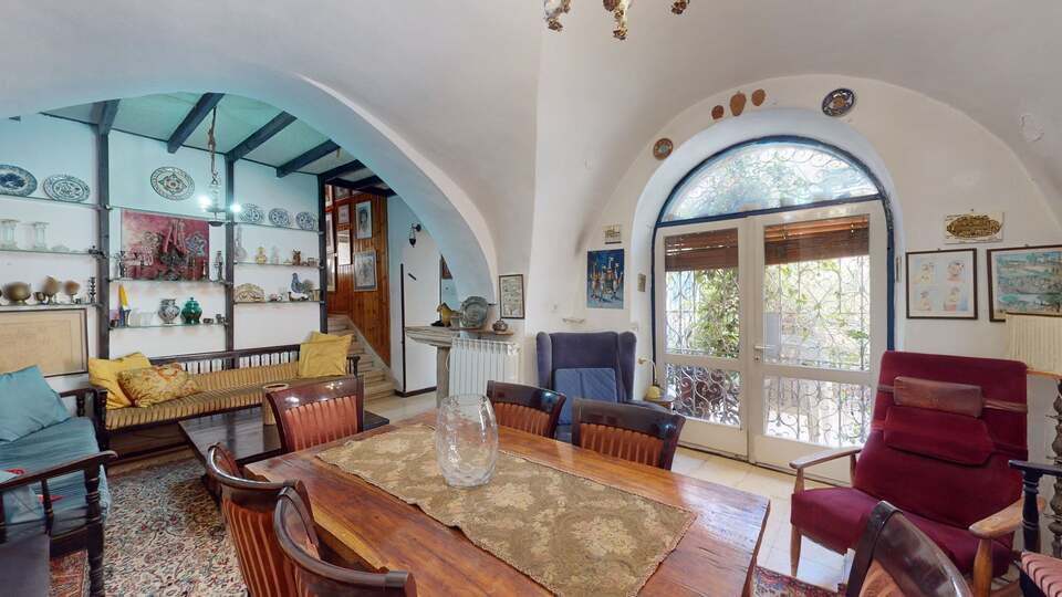 A Unique and Charming Duplex with Arched Ceilings